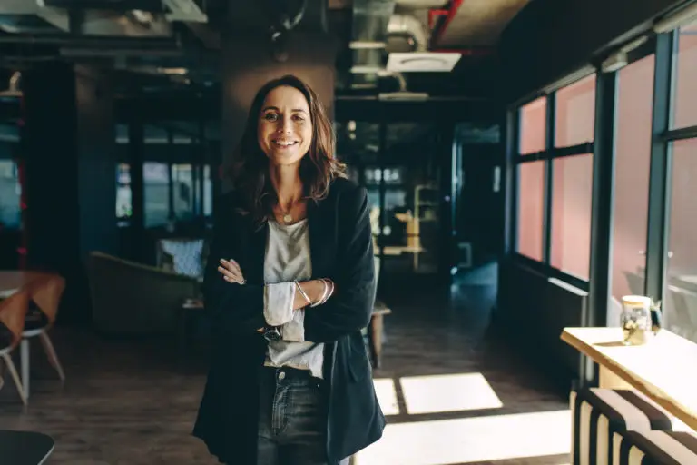 woman arms crossed workplace