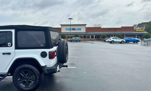 jeep parked on far parking spot